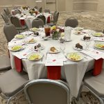 Luncheon tables at the Capstone Hotel await the arrival of TUARA members.